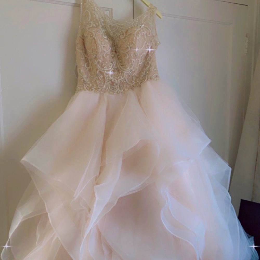 Regal Brand new wedding dress never worn purchased at a private boutique